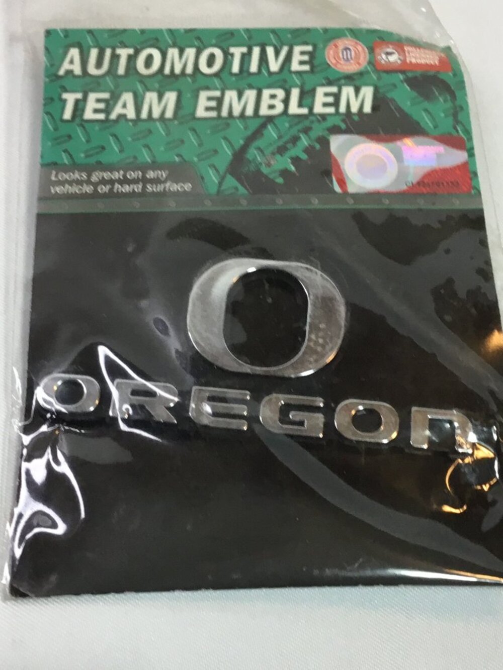 NCAA Oregon Ducks Plastic Chrome Emblem Decal Size Aprx. 4 1/4 x 2 inches NEW!